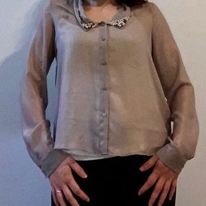 Purple sparkly blouse